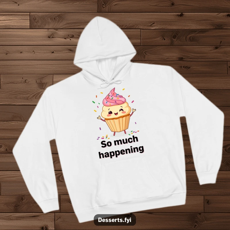 Funny Hoodie: A happy cupcake character juggles sprinkles, offering cozy comfort and sweet, playful charm.